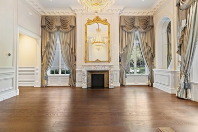 This timeless Euoprean Estate Home sits on 1.6 acres in the