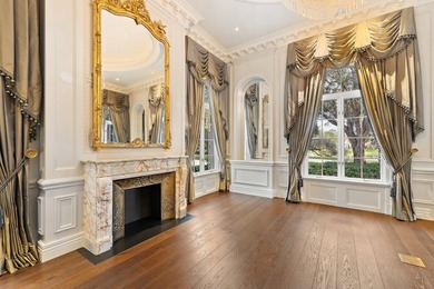 This timeless Euoprean Estate Home sits on 1.6 acres in the