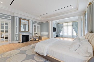 This timeless Euoprean Estate Home sits on 1.6 acres in the