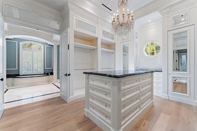 This timeless Euoprean Estate Home sits on 1.6 acres in the