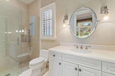 This timeless Euoprean Estate Home sits on 1.6 acres in the