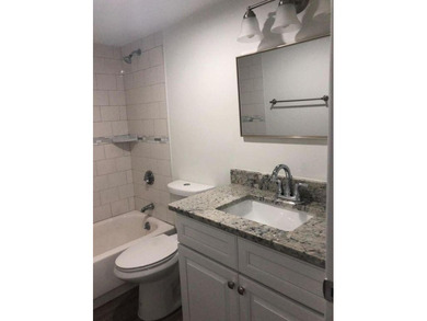 Beautiful updated 3 bedroom 2 bath condo with lake view.  Open