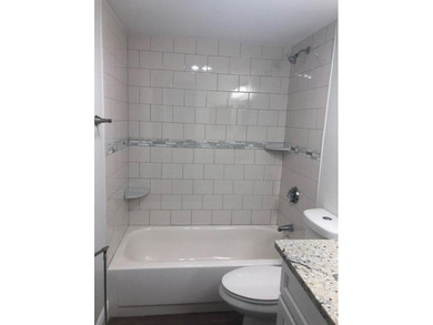 Beautiful updated 3 bedroom 2 bath condo with lake view.  Open