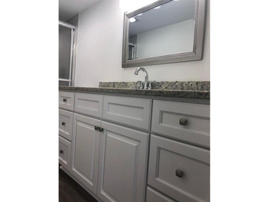 Beautiful updated 3 bedroom 2 bath condo with lake view.  Open