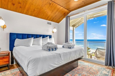 This exclusive luxury 8 BR/ 8.5 BA beachfront home is not just a