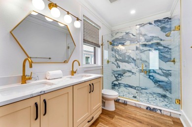 This exclusive luxury 8 BR/ 8.5 BA beachfront home is not just a