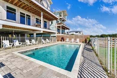 This exclusive luxury 8 BR/ 8.5 BA beachfront home is not just a