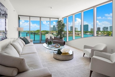 Step into this stunning corner unit at Onda, Bay Harbor's