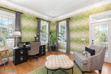 Welcome to this exquisite Charleston-style home nestled in the