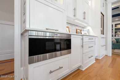 Welcome to this exquisite Charleston-style home nestled in the