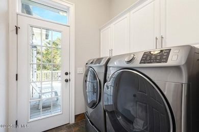 Welcome to this exquisite Charleston-style home nestled in the