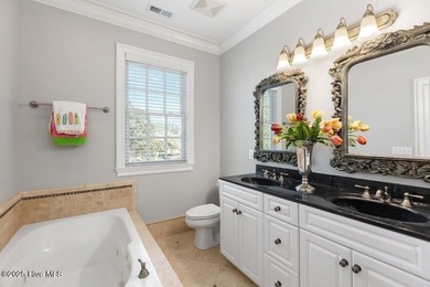 Welcome to this exquisite Charleston-style home nestled in the