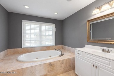 Welcome to this exquisite Charleston-style home nestled in the