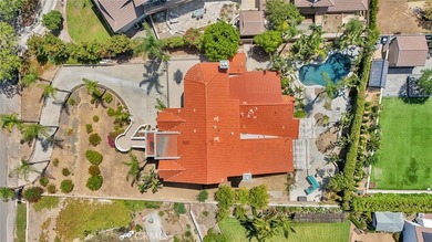 Tucked away in  quiet cul-de-sac in a gated community, this