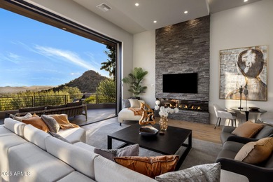 Situated in Desert Highlands coveted Hillside Villas, this