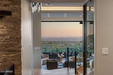 Situated in Desert Highlands coveted Hillside Villas, this