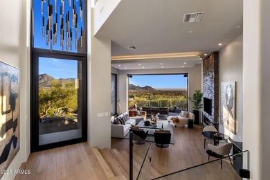 Situated in Desert Highlands coveted Hillside Villas, this