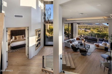 Situated in Desert Highlands coveted Hillside Villas, this