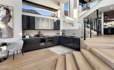 Situated in Desert Highlands coveted Hillside Villas, this