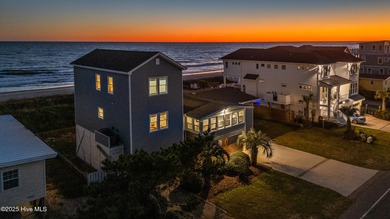 Rhapsody in Blue... Oceanfront Luxury Awaits! This extraordinary