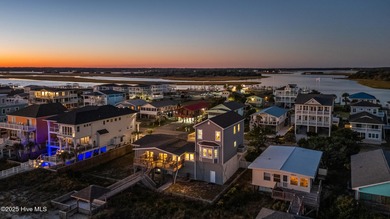 Rhapsody in Blue... Oceanfront Luxury Awaits! This extraordinary