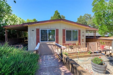 Welcome to this charming 2-bedroom, 2-bathroom manufactured home
