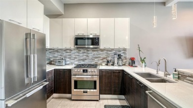 WELCOME Home to The Q an Enclave of 40 Townhomes with varied