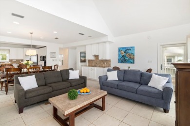 A Beautiful Towering 5 Bedroom Beachfront home located on the