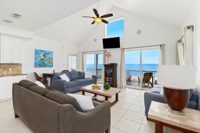 A Beautiful Towering 5 Bedroom Beachfront home located on the