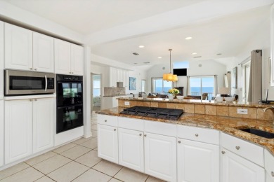 A Beautiful Towering 5 Bedroom Beachfront home located on the