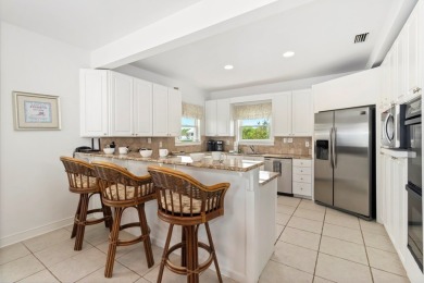 A Beautiful Towering 5 Bedroom Beachfront home located on the