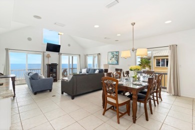 A Beautiful Towering 5 Bedroom Beachfront home located on the