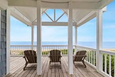 A Beautiful Towering 5 Bedroom Beachfront home located on the