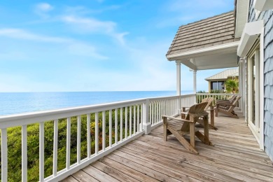 A Beautiful Towering 5 Bedroom Beachfront home located on the