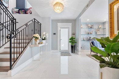 Stunning waterfront townhome offering direct Intracoastal views