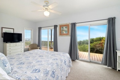 A Beautiful Towering 5 Bedroom Beachfront home located on the