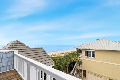 A Beautiful Towering 5 Bedroom Beachfront home located on the