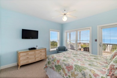 A Beautiful Towering 5 Bedroom Beachfront home located on the