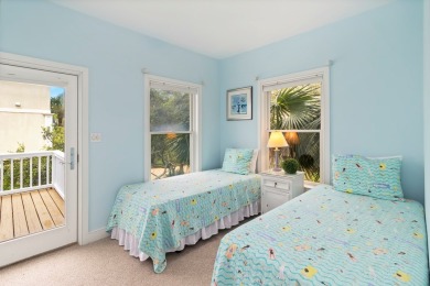 A Beautiful Towering 5 Bedroom Beachfront home located on the