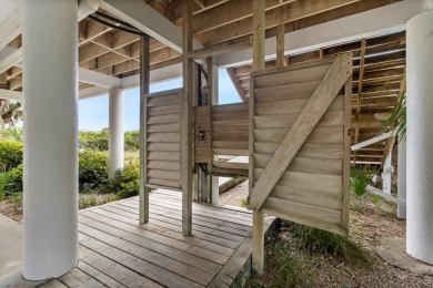 A Beautiful Towering 5 Bedroom Beachfront home located on the