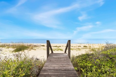 A Beautiful Towering 5 Bedroom Beachfront home located on the