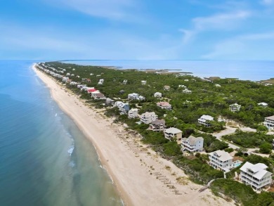 A Beautiful Towering 5 Bedroom Beachfront home located on the