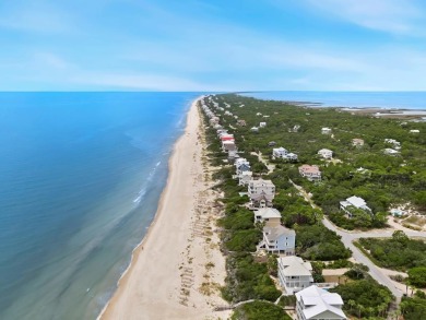 A Beautiful Towering 5 Bedroom Beachfront home located on the