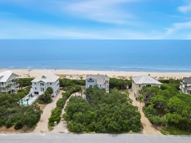 A Beautiful Towering 5 Bedroom Beachfront home located on the