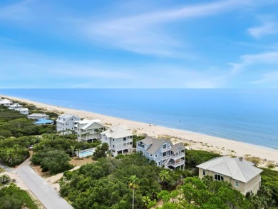 A Beautiful Towering 5 Bedroom Beachfront home located on the