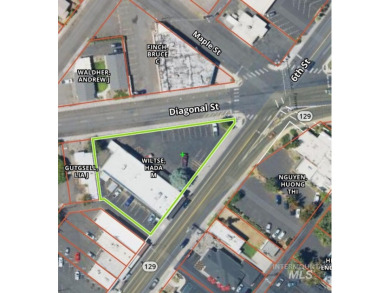 This commercial building is situated on the lighted intersection