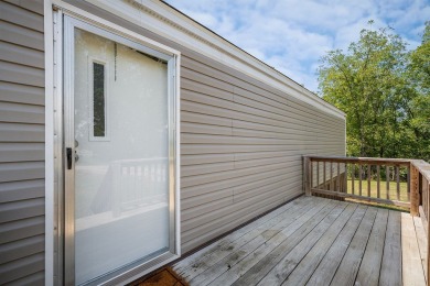 Escape to the lake with this well-maintained 2-year-old