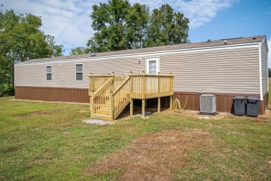 Escape to the lake with this well-maintained 2-year-old