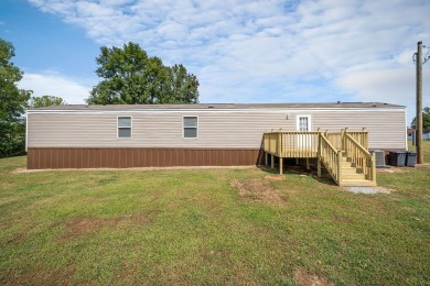 Escape to the lake with this well-maintained 2-year-old