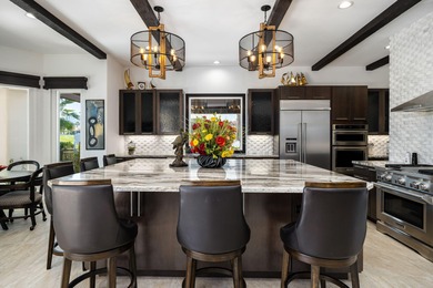 Experience desert luxury living in this impeccably reimagined 4